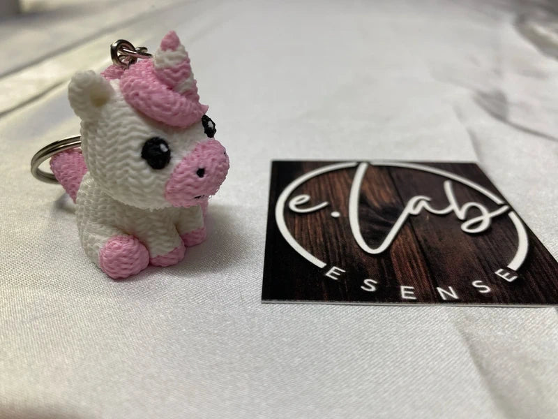 Unicorno – Portachiavi 3D rosa e bianco – Foto 1